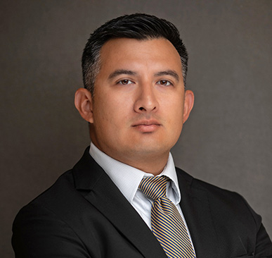 Headshot of attorney Joseph Fierros wearing a suit and tie.